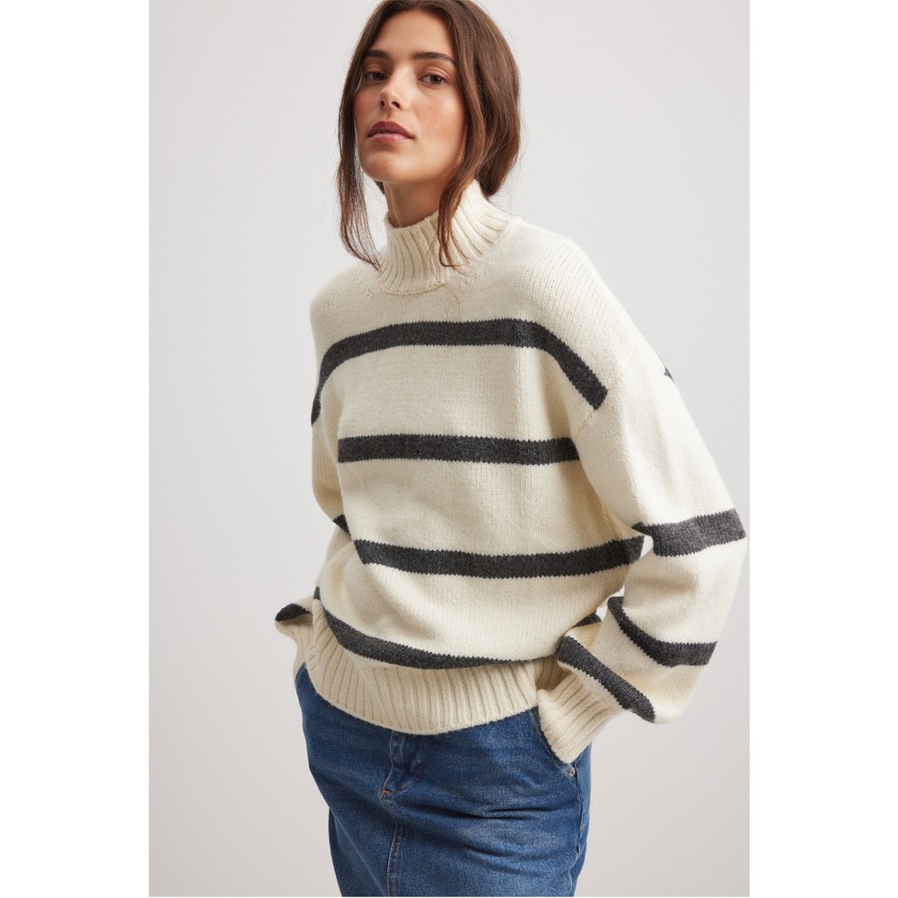 Elegant Cream and Black Striped Turtleneck Sweater